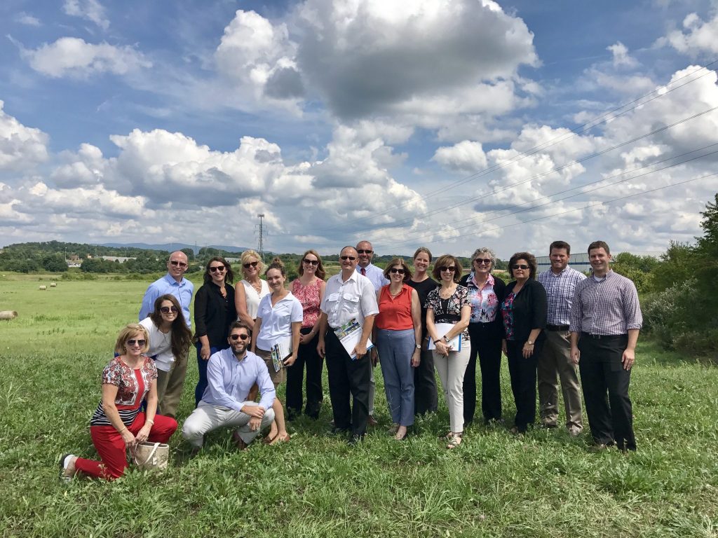 Visitors from VEDP stand at the Falling Branch Corporate Park on a beautiful day.