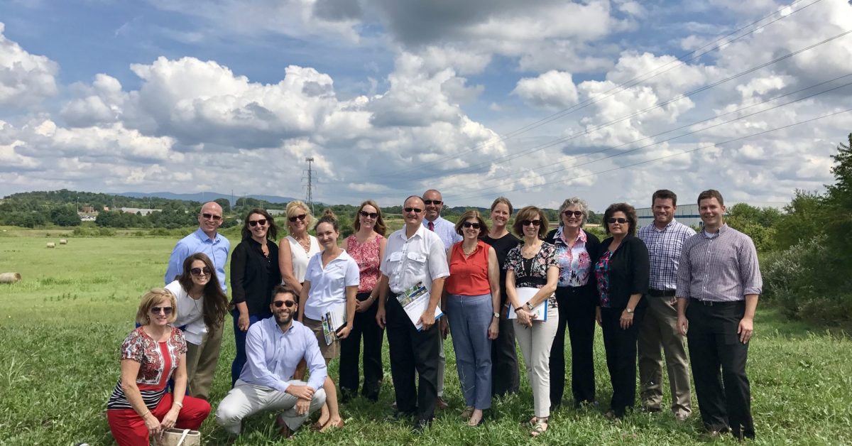Visitors from VEDP stand at the Falling Branch Corporate Park on a beautiful day.